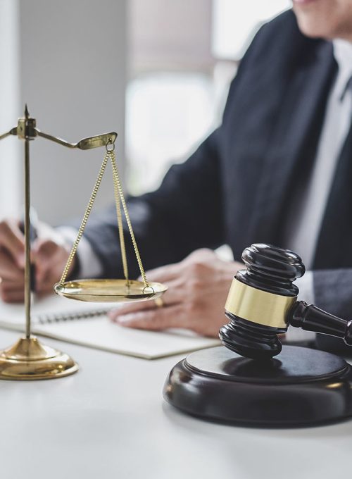 judge-gavel-with-justice-lawyers-counselor-in-suit-or-lawyer-working-with-contract-papers-on-a_t20_jLnxJv
