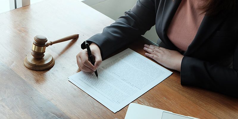 legal-counsel-presents-to-the-client-a-signed-contract-with-gavel-and-legal-law-justice-and-lawyer_t20_nRpjN4